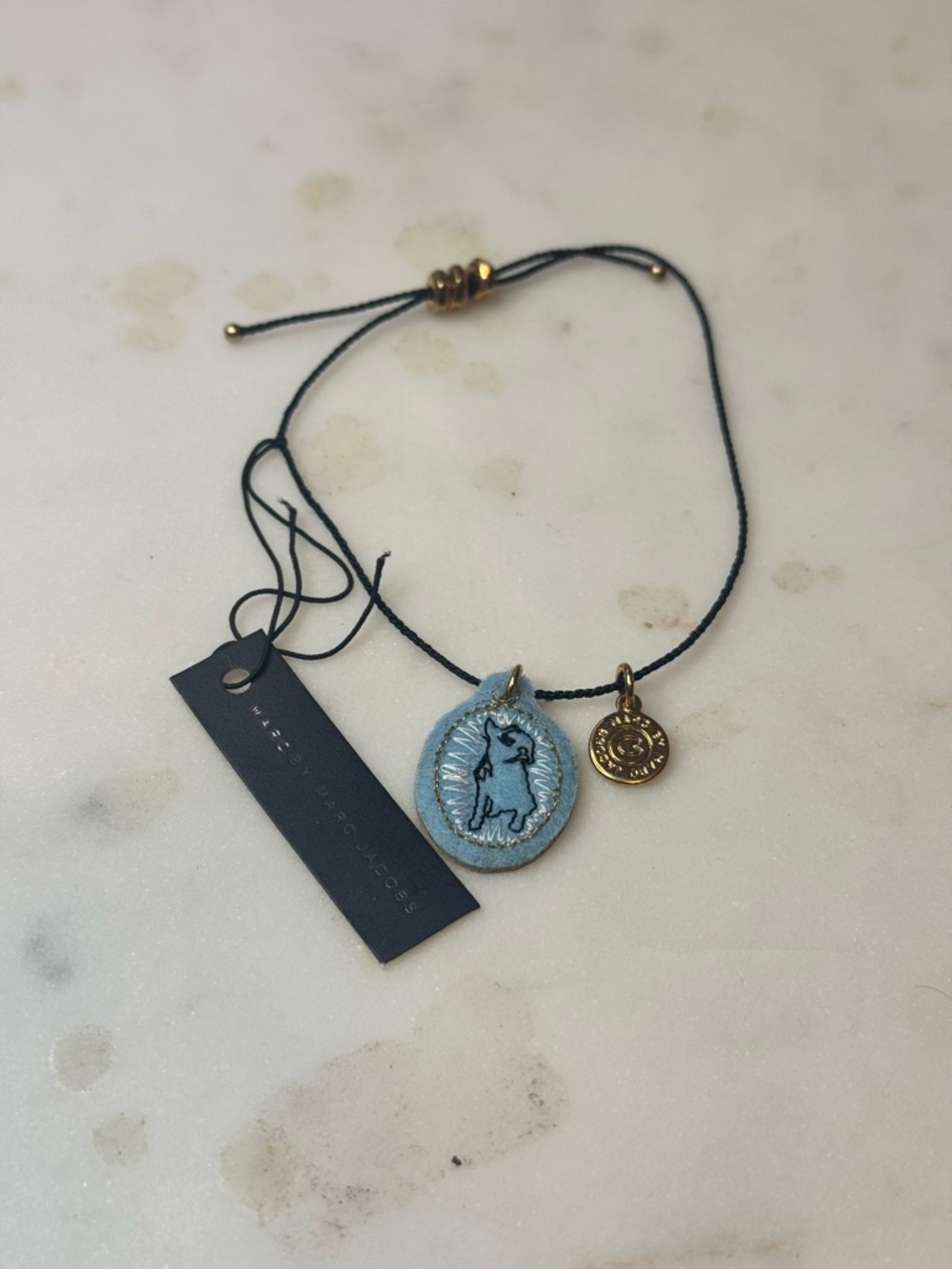 Light Blue Pendant Cord Necklace with Gold Charms